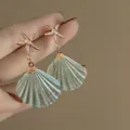 Elegant rose gold starfish and teal textured shell pendant earrings with silver pins - Starfish & Shell Style / Green
