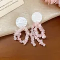 Elegant silver pin earrings featuring white resin discs and pink stone clusters - Gravel Tassel Style / Pink