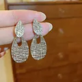 Silver teardrop drop earrings featuring a unique vintage cracked metallic texture - Cracked Double Teardrop Style (78) / Silver Needle Studs / Silver