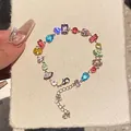 Close-up view of a vibrant colorful zircon bracelet featuring mixed gemstone cuts and shapes - Geometric Zirconia Style (WB1150) / Colorful