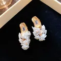Elegant 18K gold plated pearl cluster stud earrings with square crystal detail - Square Rhinestone Floral Style (WE1928)
