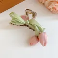 Detail of a sweet tulip flower hair claw clip with a green satin ribbon bow. - Hair Claw / Green Pink