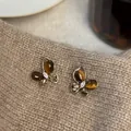 Elegant butterfly stud earrings featuring tiger eye stones and zircons on soft knit fabric - Butterfly Style (WE5732-1)