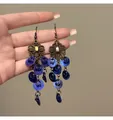 Vintage silver needle drop earrings featuring blue resin discs and ornate bronze floral motifs - Style 35 Ear Hook Disc Flower (5942177792988) / Sapphire Blue