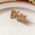 Elegant four-petal flower stud earrings with crystal inlay on a triangular base. - Style 106 Four-Petal Flower (5942177792992) / Gold