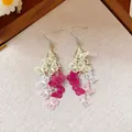 Elegant gradient butterfly tassel earrings with multiple layered charms in pink and yellow - Style 83 Ear Hook Butterfly Tassel (5942177792999) / Pink