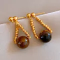Elegant 18k gold plated twisted drop earrings with round brown tiger eye beads for women - Twisted Teardrop Style (37#)