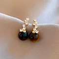 Zircon earrings with imitation tiger eye stones and 925 silver needles for luxury style. - Vertical Curve Style (54#)