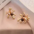 Elegant butterfly stud earrings with zircon and imitation tiger eye stone in gold - Artistic Butterfly Outline Style (13#)