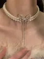 Elegant double-row pearl necklace with rhinestone butterfly pendant and long tassels - Double-layer Bow Tassel