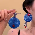 Elegant gradient blue shell round earrings with unique knot detail and red beads - Design Style (16#) / Blue