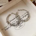 Créoles texturées argentées avec une finition pailletée métallique - Grande Créole en Métal Texturé (22#)