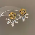 Pendientes de rosa dorada vintage con cristales marquise claros y agujas de plata - Oro antiguo