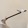 Elegant handmade dark wood hair stick featuring a delicate white flower and green leaf - White Floral Style (HH6014)