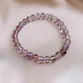 Elegante bracciale vintage di perline di cristallo su sfondo di morbido raso rosa - 6mm / Viola