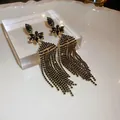 Vintage gold-toned long tassel earrings with black zirconia flower studs for women - Rhinestone Flower Tassel Style (44)