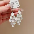Vintage French style teardrop tassel drop earrings with pearlescent shell-like finish - Hook Style / Silver-White
