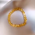 Elegante bracciale in cristallo di pietra del sole dorata con perline tonde chiare - 7mm / Giallo