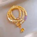 Elegante bracciale multistrato in cristallo di pietra del sole con perla e portafortuna - Stile 61 (Fortuna) / Oro/Giallo