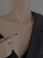 Double-layer gold choker necklace with a baroque pearl pendant for women - Necklace Style 37