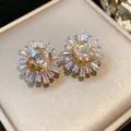 Macro view showing the intricate details of vintage champagne zircon floral stud earrings - Gold Base / Brown