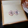 Detailed view of pink enamel flower earrings featuring a sparkling central crystal - Silver Needle / Gold-Pink