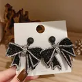 Elegant black bow-knot earrings with silver needle and sparkling rhinestones - Black Pave Rhinestone Luxury Bowknot Earrings (32# Silver Needle - Black) / Black