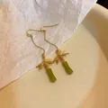Elegant Neo-Chinese style bamboo tassel earrings with green pendants in gold finish - Earring Hook (89) / Gold-Green