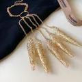 Detailed view of intricate gold filigree nail cover bracelet with tassel chains jewelry - 5-Claw Style (1 Hand Bracelet)