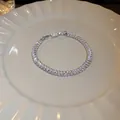 Detailed view of shimmering baguette-cut zircon bracelet on an elegant white ceramic plate - Rectangle Style (38#)