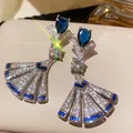 Macro detail of elegant fan-shaped drop earrings featuring blue pear-shaped gemstones - Vintage Fan Style (WE5873) / Silver Needle / 4# Silver Blue