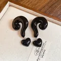 Exaggerated black resin question mark earrings with dangling heart charm for women - Black