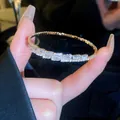 Elegant gold-plated bracelet with shimmering baguette-cut cubic zirconia - Baguette Zirconia Style (58#)