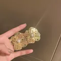 Elegant vintage-style gold flower stud earrings with pearl center and colored stone detail - Gold Rhinestone Petal Earrings (17)