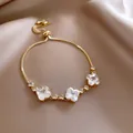 Gold-plated adjustable chain bracelet with sparkling floral-shaped cubic zirconia - Three-Petal Flower Zirconia Box Chain Style (124#)