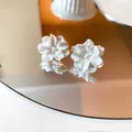 Elegant white pearly flower stud earrings featuring a vintage French design for women - White 3D Flower Earrings (23)