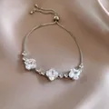 Elegant silver-plated bracelet with sparkling zircon clover charms on satin background - Clover Zirconia Box Chain Style (12#)