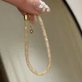 Elegante bracciale a rete in cristallo dorato stardust con catenina di estensione regolabile - Stile Rete Base / Oro