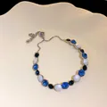 Elegant gold-plated zircon bracelet with blue and white stones, adjustable fit for women. - Three-Color Alternating Zirconia Style (142#)