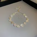 Elegant 18k gold plated bracelet featuring heart charms and shimmering zircons for women - Heart Sunflower Style (17#)