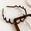 Elegant coffee brown fabric wrapped headband featuring non-slip teeth for hair styling - Satin Wrapped Style / Brown