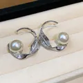 Elegantes pendientes de aro de hoja retorcida plateada con perlas grandes en bandeja - Plateado