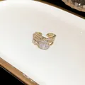 Detail view of an elegant gold finish open ring featuring a large oval cubic zirconia - Oval Zircon Open Style / Adjustable Open / Gold