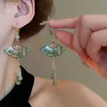 Neo-Chinese waaier oorbellen met groene bamboe patronen en elegante lange kwastjes - Waaier Bamboe Oorhaak Stijl / Goud-Groen