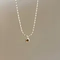Vintage French style bamboo chain necklace with a small round amber stone pendant - Gold