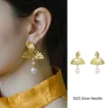 Elegante goudkleurige waaieroorbellen in Neo-Chinese stijl met parels en S925 zilveren pen - Waaier Parel Zilveren Stift Stijl / Goud
