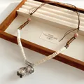 Vintage Maillard style beaded necklace with brown leather cord and silver bell pendant - Style 30-Silver White Coffee