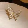 Elegant gold-plated butterfly ring with sparkling zircons and delicate pearls detail. - Butterfly Pearl Style