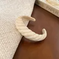 Vintage cream colored resin open cuff bracelet with twisted geometric pattern for women - Style 24