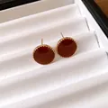 Elegant retro French circular earrings with deep red enamel and gold beaded edge - Stud Earrings / Brown
